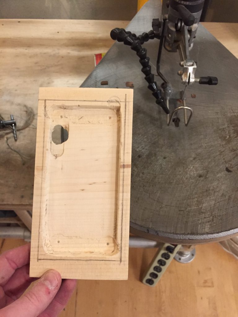 Routing and sanding the inside is complete. Now to cut off the excess.